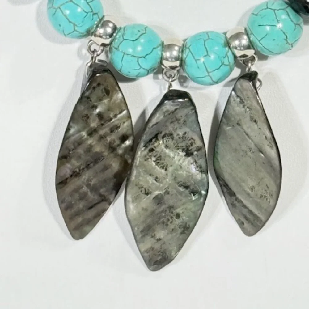 Silver-tone and turquoise-colored 18